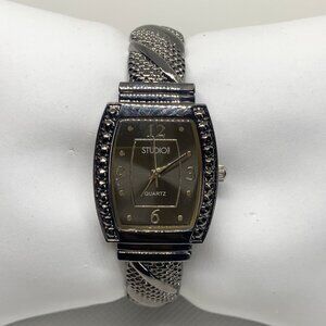 Studio black tone women’s cuff bracelet watch quartz analog 25mm running